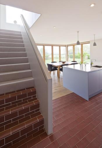 Staffs red rectangular quarry tiles laid over underfloor heating